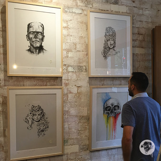 Andrew Kostakis form AK Cartooning holding a Exhibition at the White Wall Sydney.